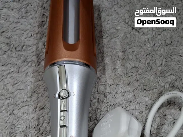 أداة تجعيد الشعر الفورية