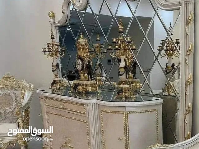 السلام عليكم موجود طاولة سفره مع 8كراسي +دنسوار خشب زان ثقيله نفس الي بالصورة بس الموجودة خشب غير م