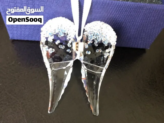 ميدالية سوارفسكي جناح الملائكة للسيارة