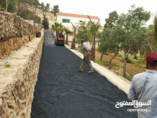العربية لأعمال تزفيت الساحات وطرق وعزل للاسطح والجدران