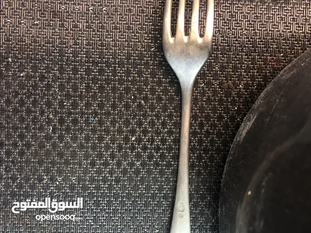 شوكة فضية قديمة