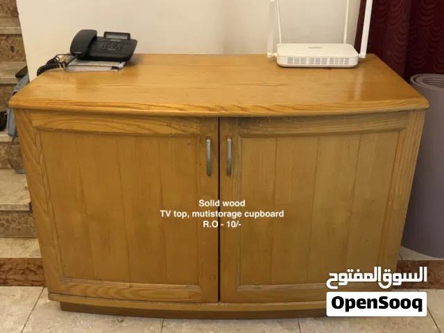 Expat Living - TV stand with storage shelf