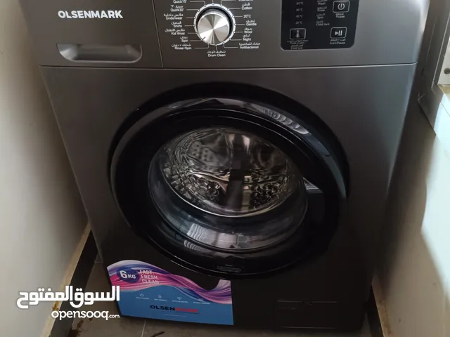 Olensmark Front load washing machine -6 Kg- used -warranty