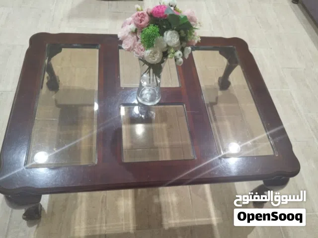 طاولة وسط خشب وزجاج حجم كبير