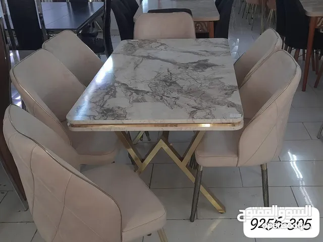 brand new dining table with four and six chairs