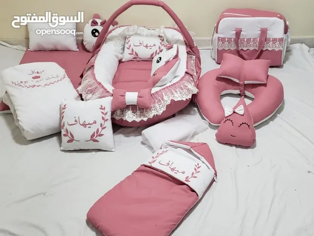 مستلزمات المواليد هناديل اكياس لحافات شناط مخدات شيلان بطانيات