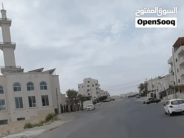 ارض للبيع بسعر مغري الجبيهة حي المنصور قرب مسجد الشعلان على شارع الثلاثين