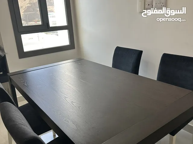Dinning table with chairs- got it new just 15 days back