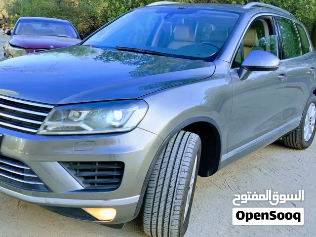 إعلان للبيع المستعجل بداعي السفر النهائي : فولكس واجن طوارق 2015 شرط الفحص.  بحالة ممتازة