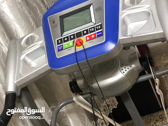 جهاز جري وشد الجسم
