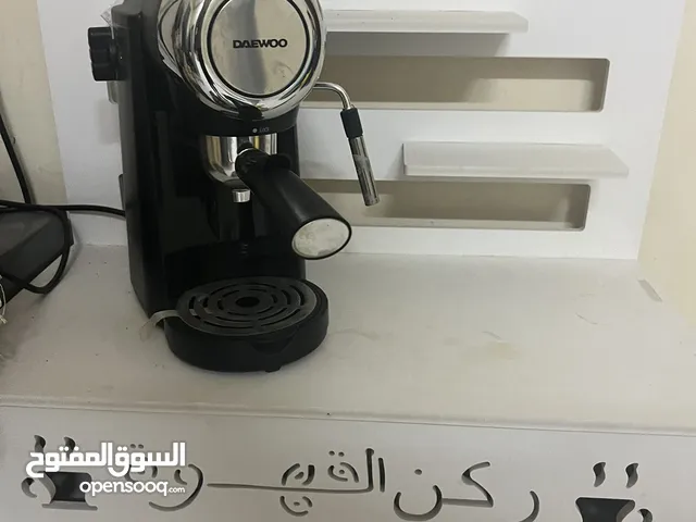 طاولة القهوه مع مكينة القهوه