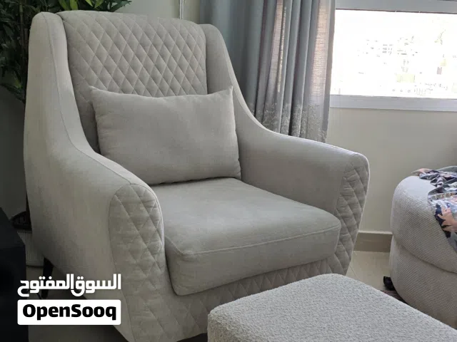 Elegant single seater sofa  Chair with footrest  in excellent condition