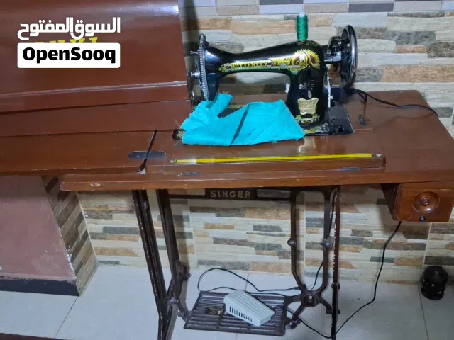 ماكنة خياطه سنجر جديده