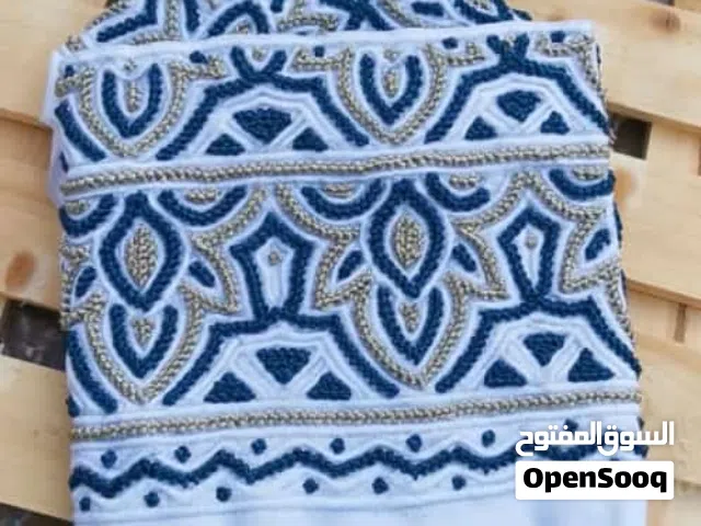 نقوم بتفصيل كميم عمانيه خياطه يد بغرزه العقده  ..