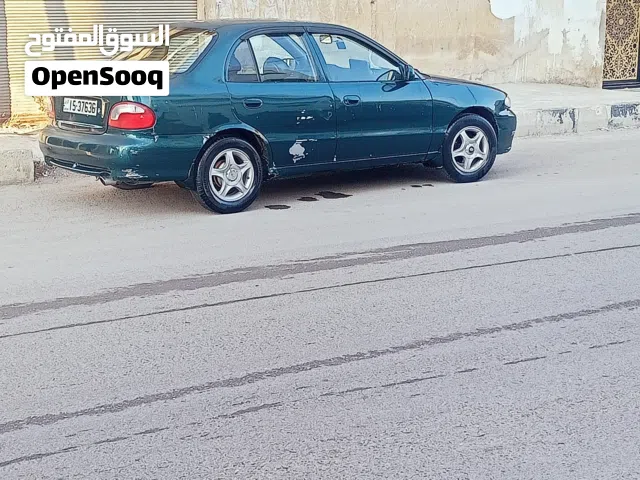 سيارة هيونداي اكسنت 1995 كوبيه مستعملة بحالة ممتازة مع مواصفات كوريا