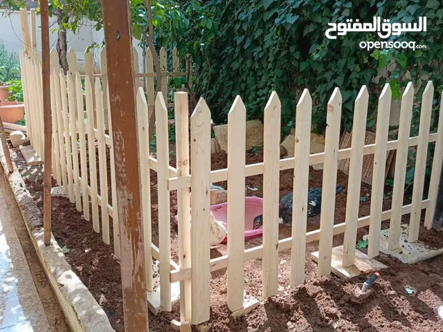 حربات خشب سويد سويدي للديكور ورفع الأسوار وعمل أبواب سحاب للكراجات والحدائق وحول قرميد اشجار الزينة