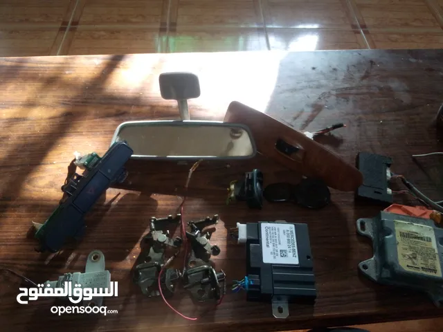 قطع سيارات لقمتين ابواب وا كبسة رباعي لمتسوبيشي لانسر  وكمبيوتر مرسيدس  منضم البنزين
