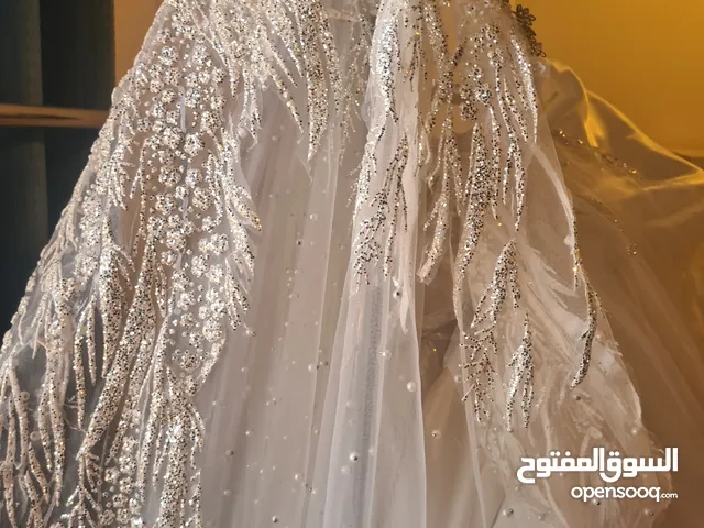 فستان عروس ابيص ملكي موديل حديث
