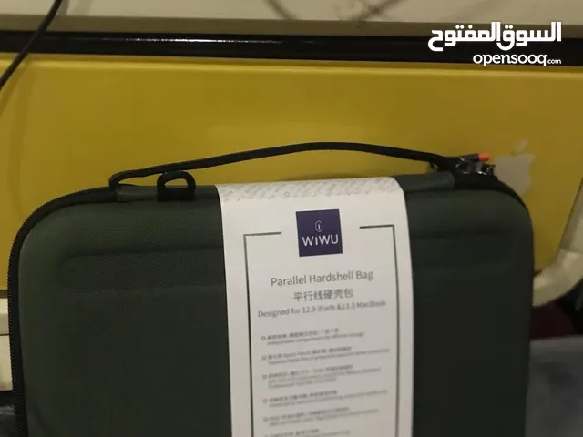 حقيبة ايباد ومستلزمات شخصية مستخدمة من شركة Wiwu مضادة للماء والصدمات وحجم متوسط