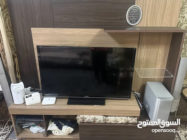 Wooden TV stand with cabinet and other storage units for sale