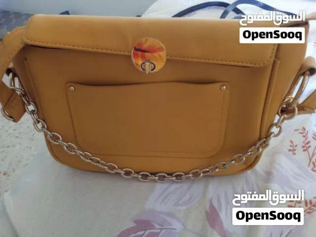 شنط نسائيه للبيع حجم كبير ووسط