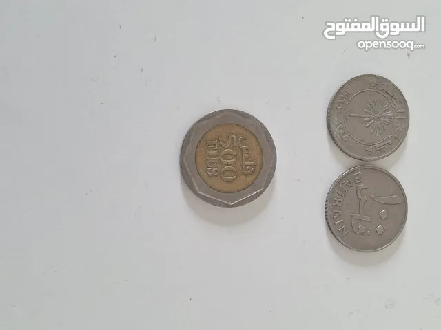 عملات قديمة 500 فلش شعار الدوار و 100 فلس قديمة حبتين