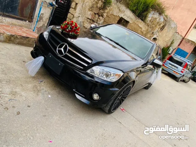 مرسيدس c200 2009 ترخيص 12 فل اضافات عدا فتحة  موتور 1800ccبنزين  تعديل خارجي كامل AMG