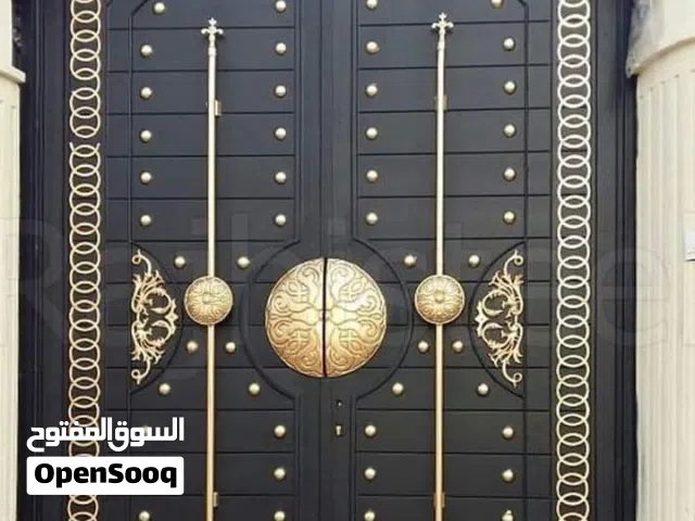 دهان ابواب حديد