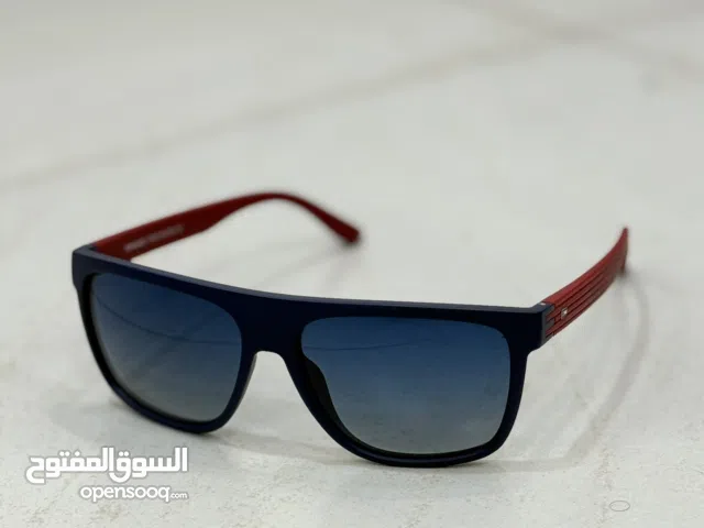 نظارة شمسية اصلية (Tommy Hilfiger Sunglasses) نظيفة (يدوية الصنع ,polarized , vintage)
