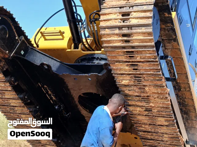 غسيل وتشحيم الات ثقيله طرابلس وضوحيها