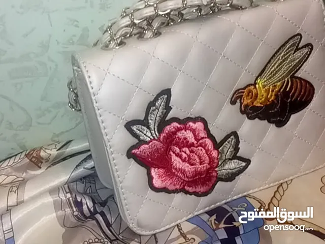 شنطة رمادي