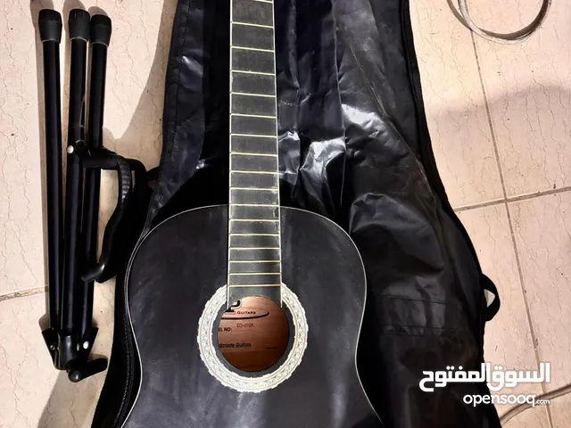 جيتار كلاسيكي بدون أوتار مع جميع الاغراض التي تخصه و ستاند و شنطه Classical guitar without strings