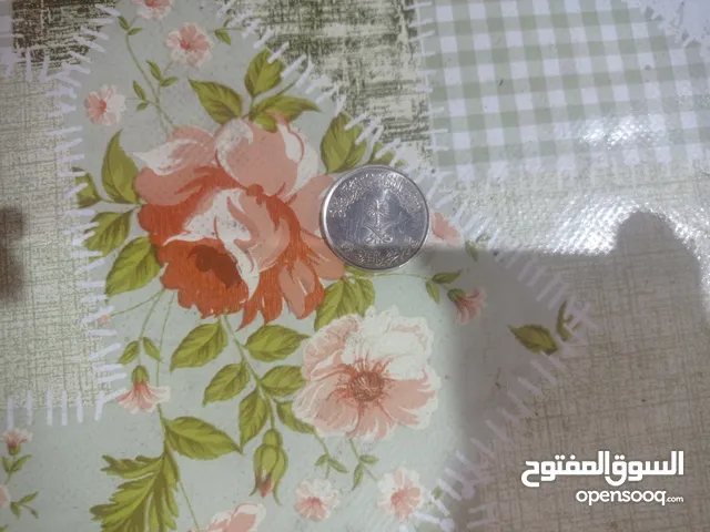 نص ريال سعودي وعملات فاروق العقدة