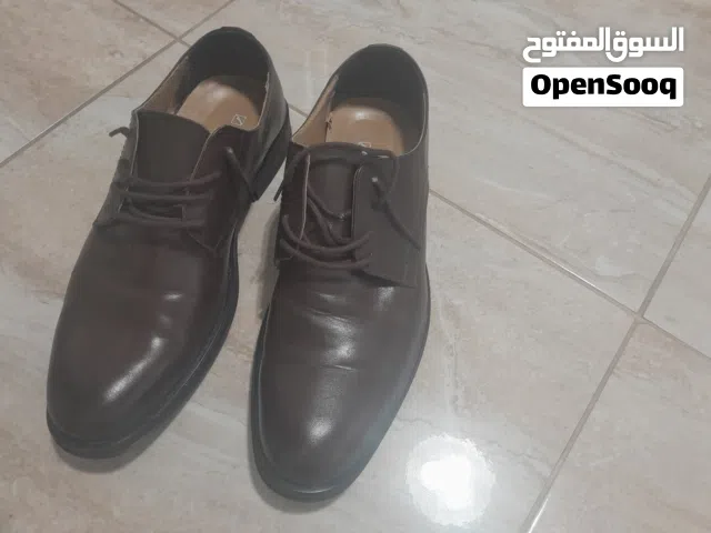 حذاء رجالي لون بني ماركة كونكورد بحالة الجديد..نمره 41