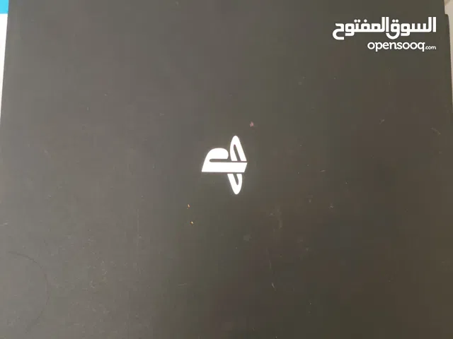 PS4 pro 1 tb with 2 controllers and one game