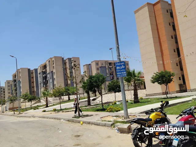 محل تجاري في منطقه 390 فدان في حداىق أكتوبر بجوار ابني بيتك السابعه و مشروع 557 عماره