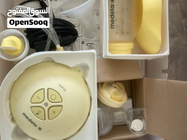 Medela Swing Single Electric Breast    شفاط حليب ميديلاPump  عبوات حفظ الحليب cooler bag و
