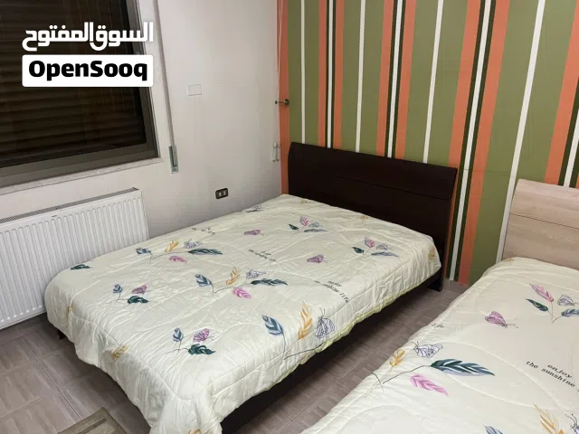 غرفة نوم مفرد و نص