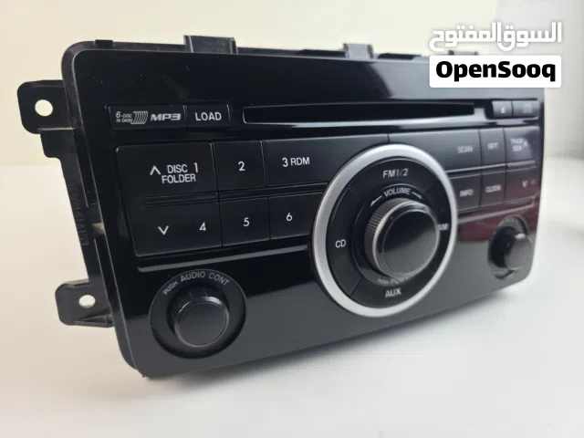 مسجل mazda cx-9 الاصلي CD CHANGER مفكوك عن سيارة بحال الوكالة للبيع
