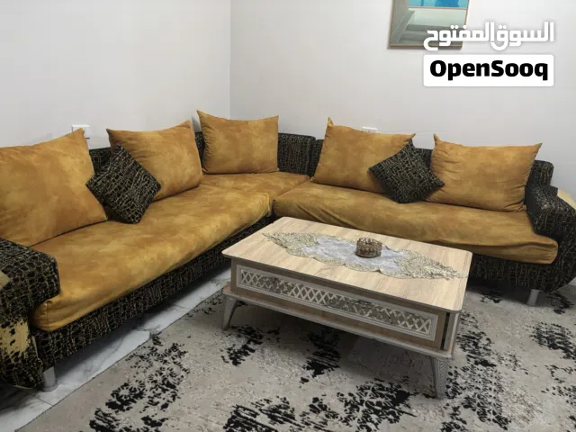 طقم كنب اصفر مع الموكيت