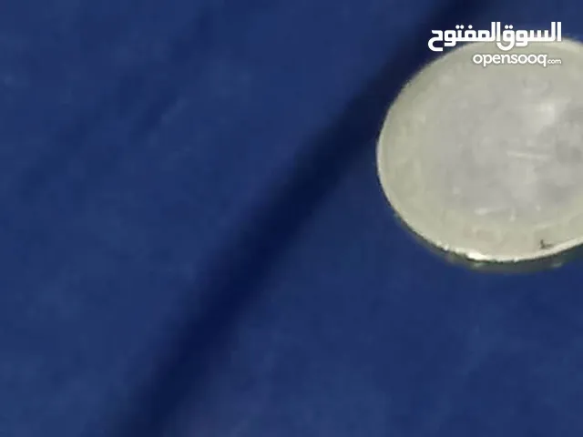ساعه وخنحر فضه وعملات معدنيه