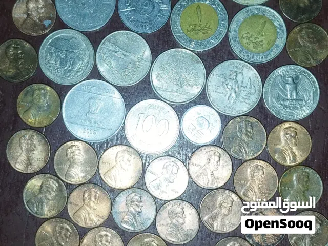 عملات متنوعة يمني ومصري وامريكية وصيني