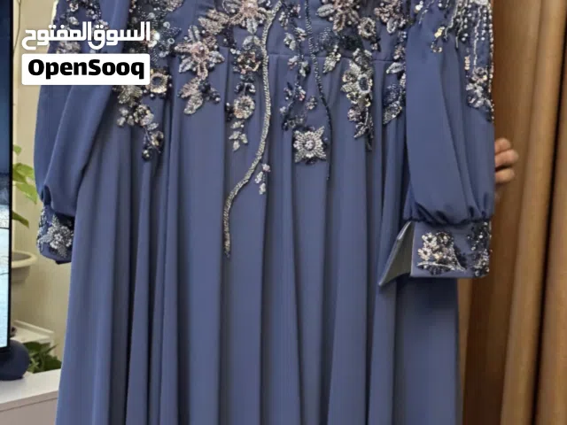 فستان سهرة لون ازرق فاتح