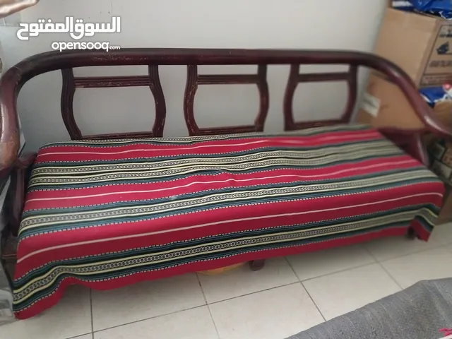 wooden sofa with storage area