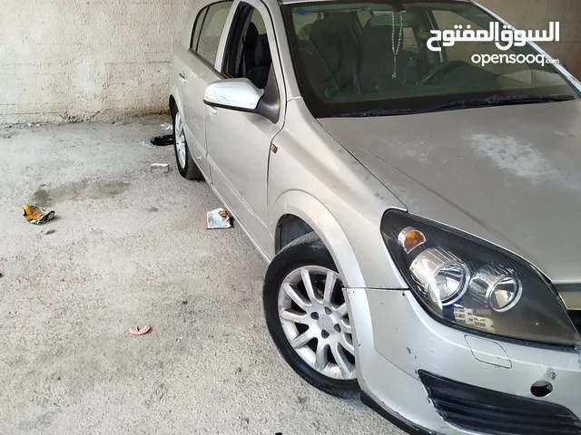 اوبل استرا بصلاة عنبي