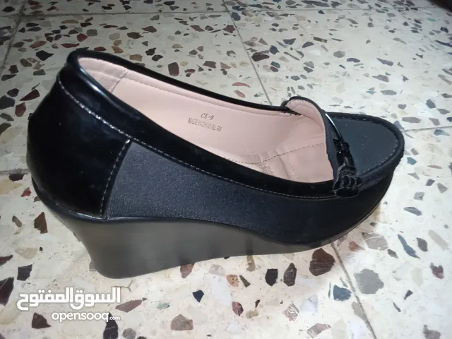 Black With Heels in Amman