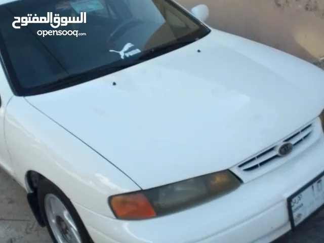 كيا سيفيا لون ابيض دهان جيد