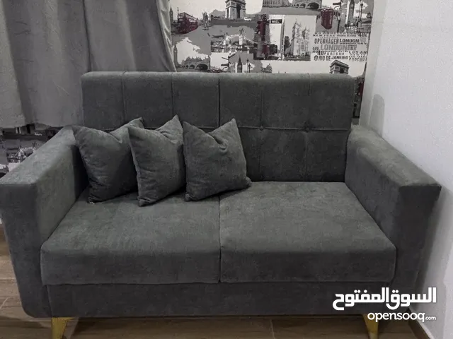 كرسي انيق باللون الرمادي الغامق للبيع - جديد تماماً ولم يستخدم (تفصيل)!!!