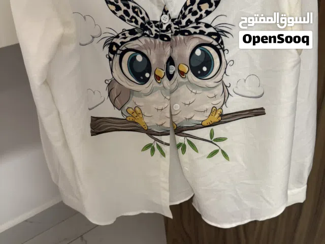 قميص ابيضّ أكمام طويله