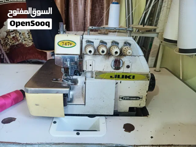 مكنة اوفر اربعه فتله موتور خارجي بحاله جيده